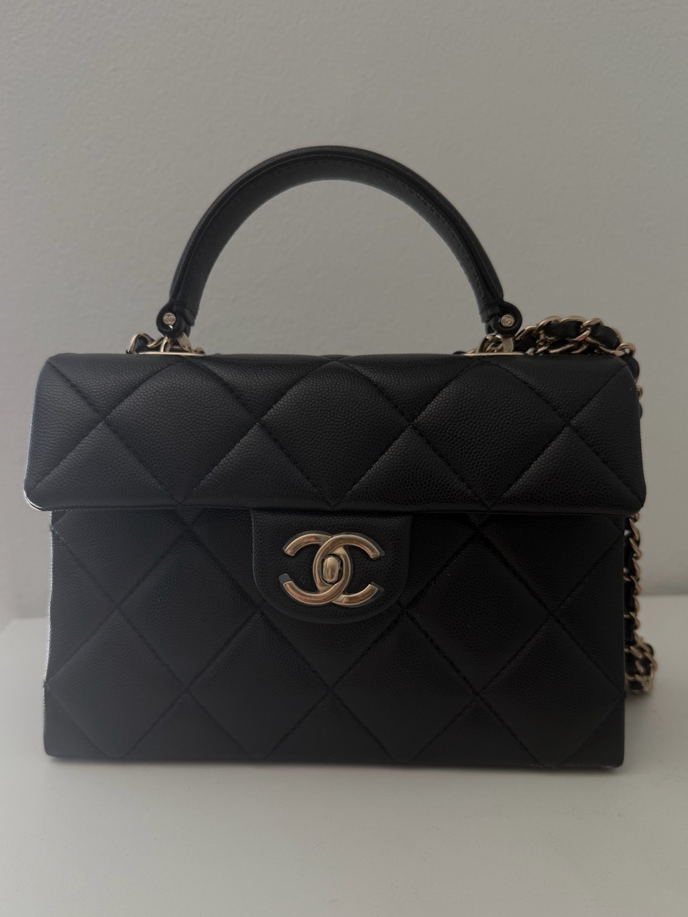 CHANEL Black Quilted Satchel with Gold-Tone CC Lock